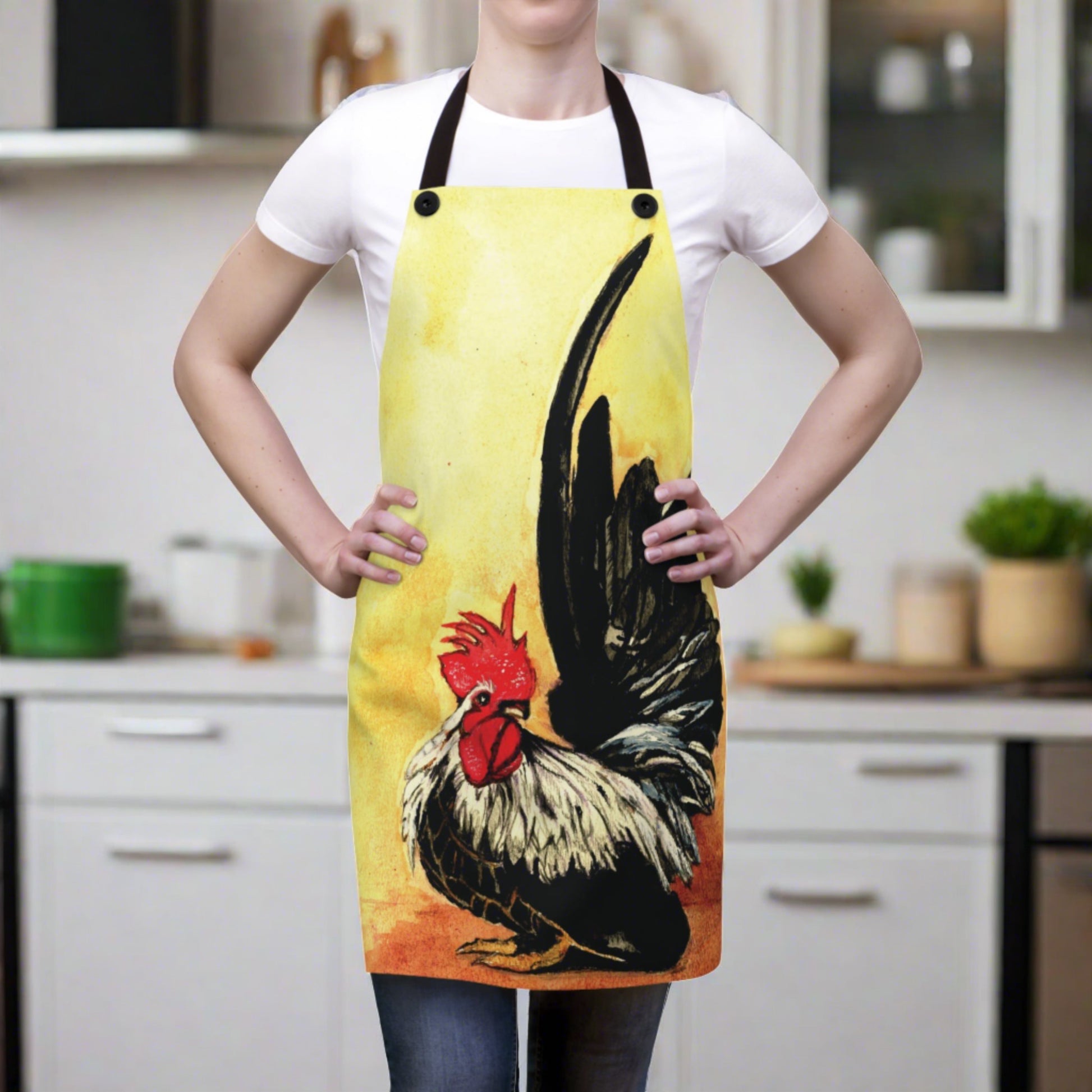on a silky apron sits a watercolor design of Japanese Rooster in black & silvers with a bright red head with a yellow and orange background - apron has 4 straps that button on