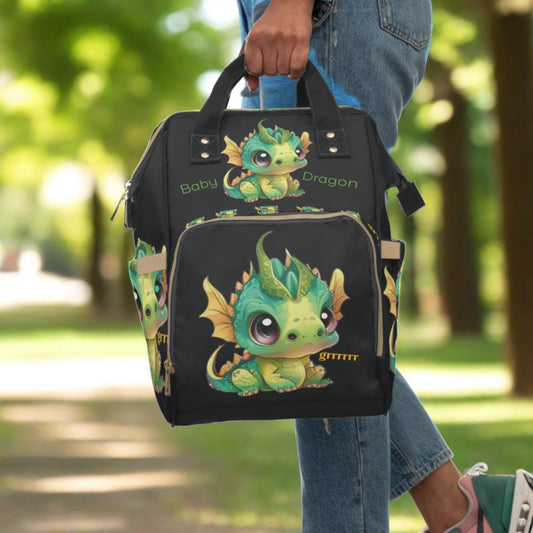 A black backpack/diaper bag with top handles too - a front zipped pocket with a baby Bobby dragon grrr on it - baby Bobby Dragon is on the top - front- back & sides - text Baby Dragon on the front - inside pockets & sturdy zipper and well made