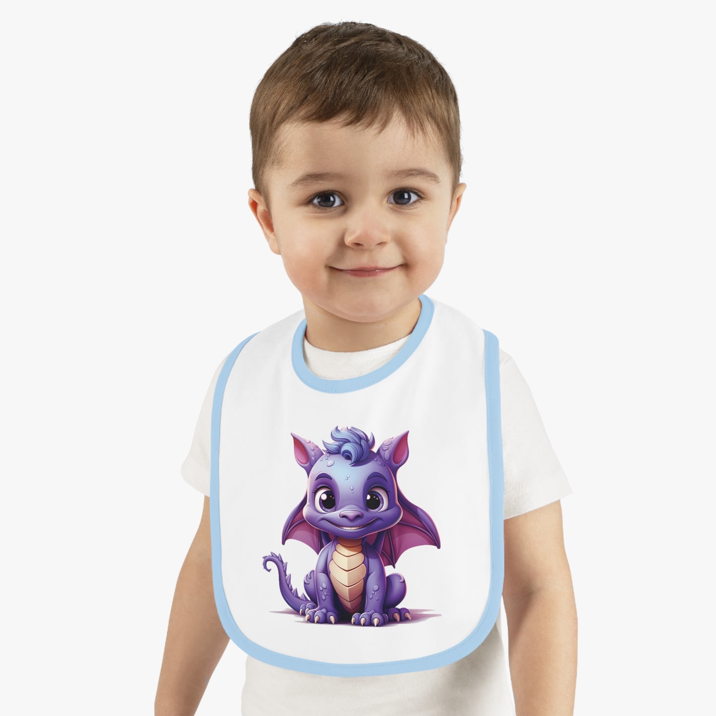 A white 100% cotton baby bib trimmed in blue - with a purple baby Happy dragon in the center - a large bib super cute.