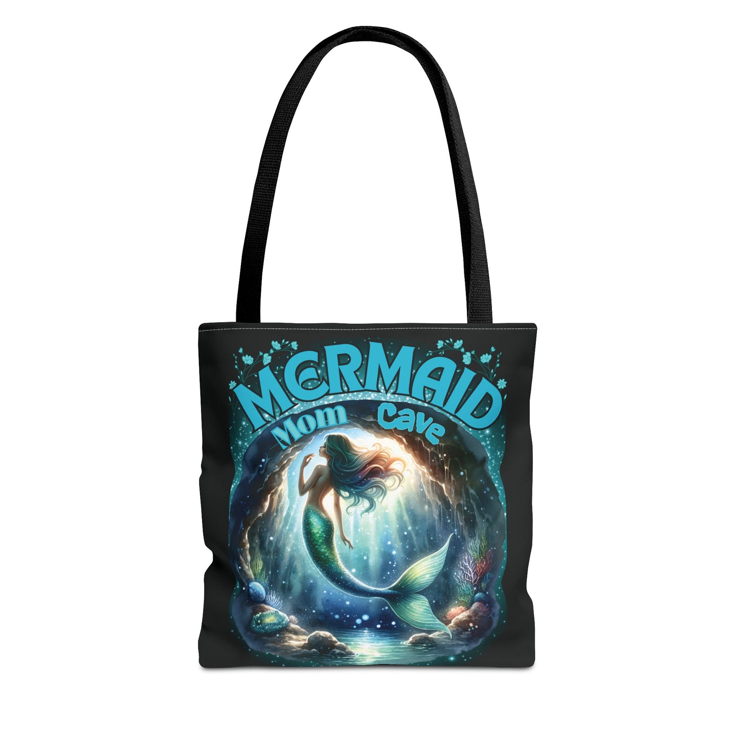 A gorgeous mermaid swims in her mermaid mom cave with her sea shells and plants around her - Mermaid Mom Cave is the text above her cave with blue flowers above the text - black bag - inside too- handles