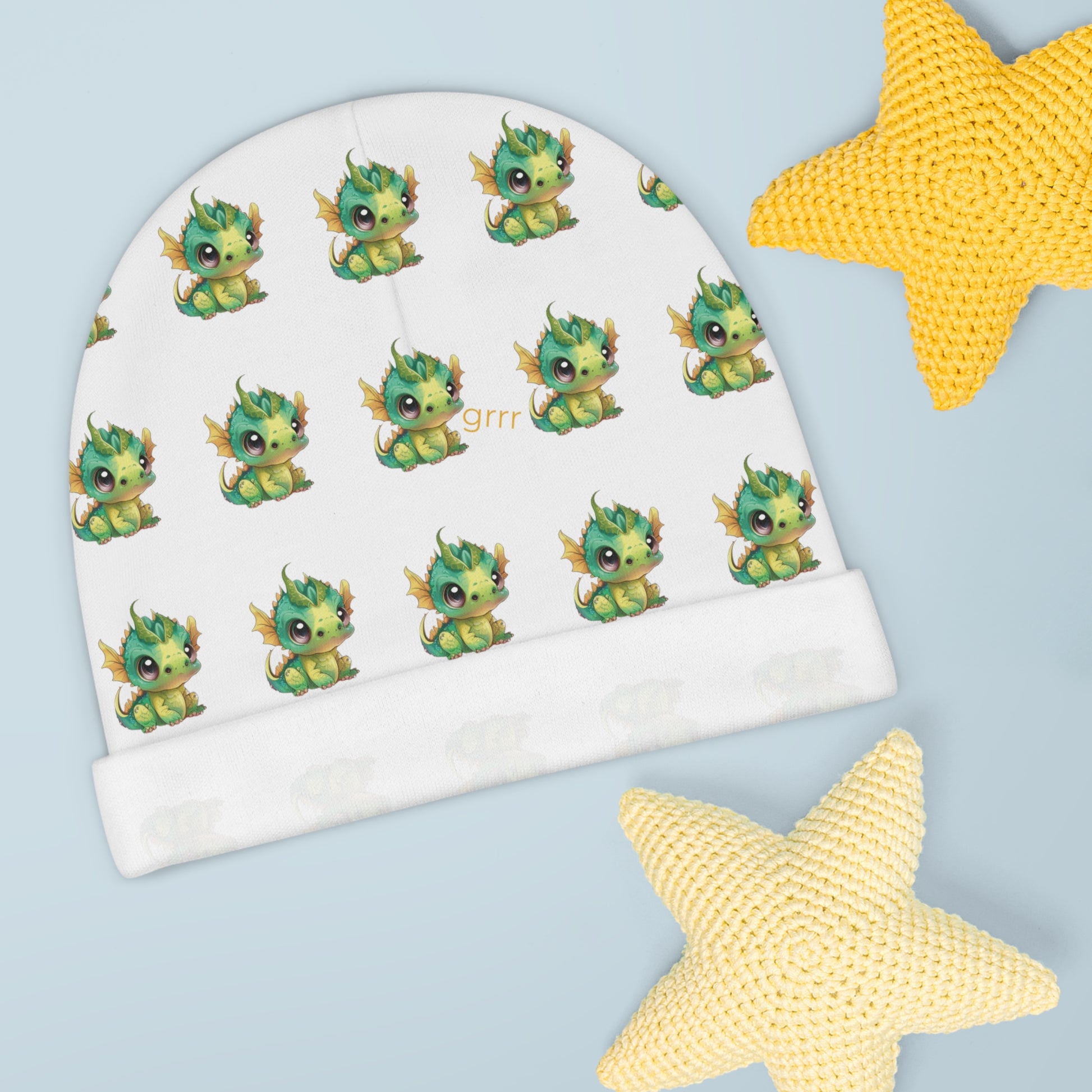A darling baby beanie cap with green baby Bobby Dragons all over it - one little dragon is saying grrr - lol - so fun.