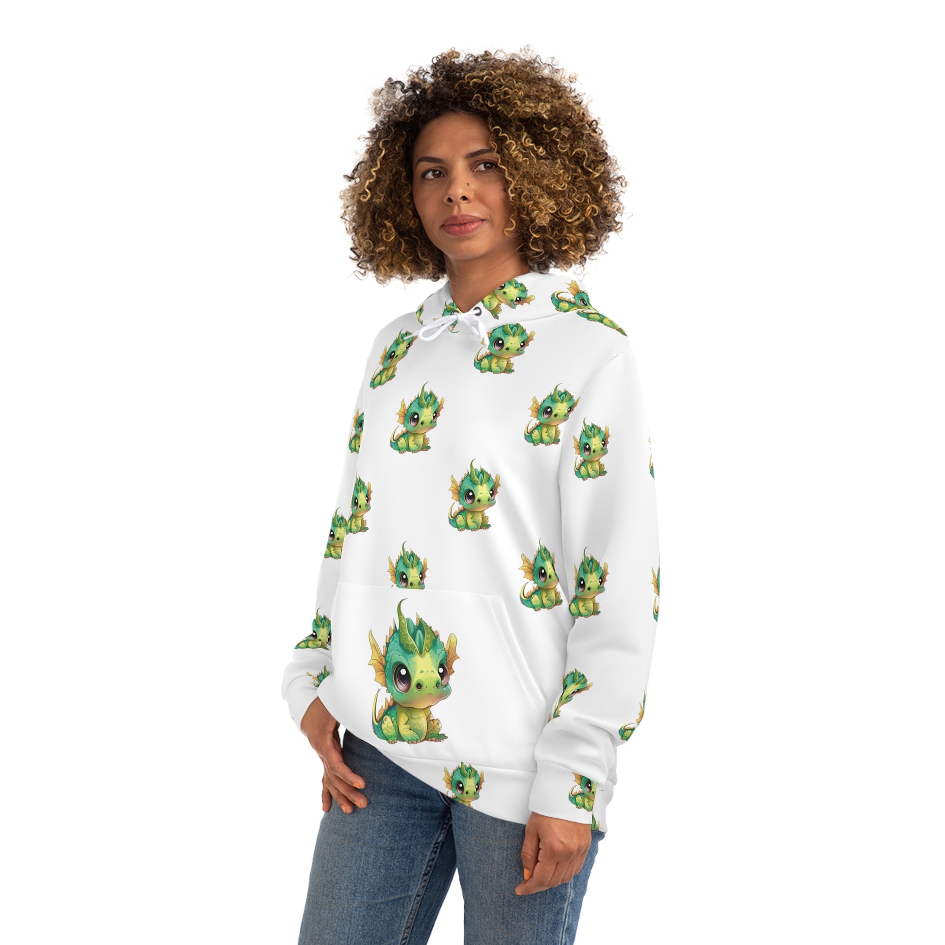 On a hoodie with a large front pocke sits a cute baby Bobby Dragon in greens yellows and a green baby horn - he is all over the hoody about 3 inches tall and 3 inches away from each other on this all over print hoody.